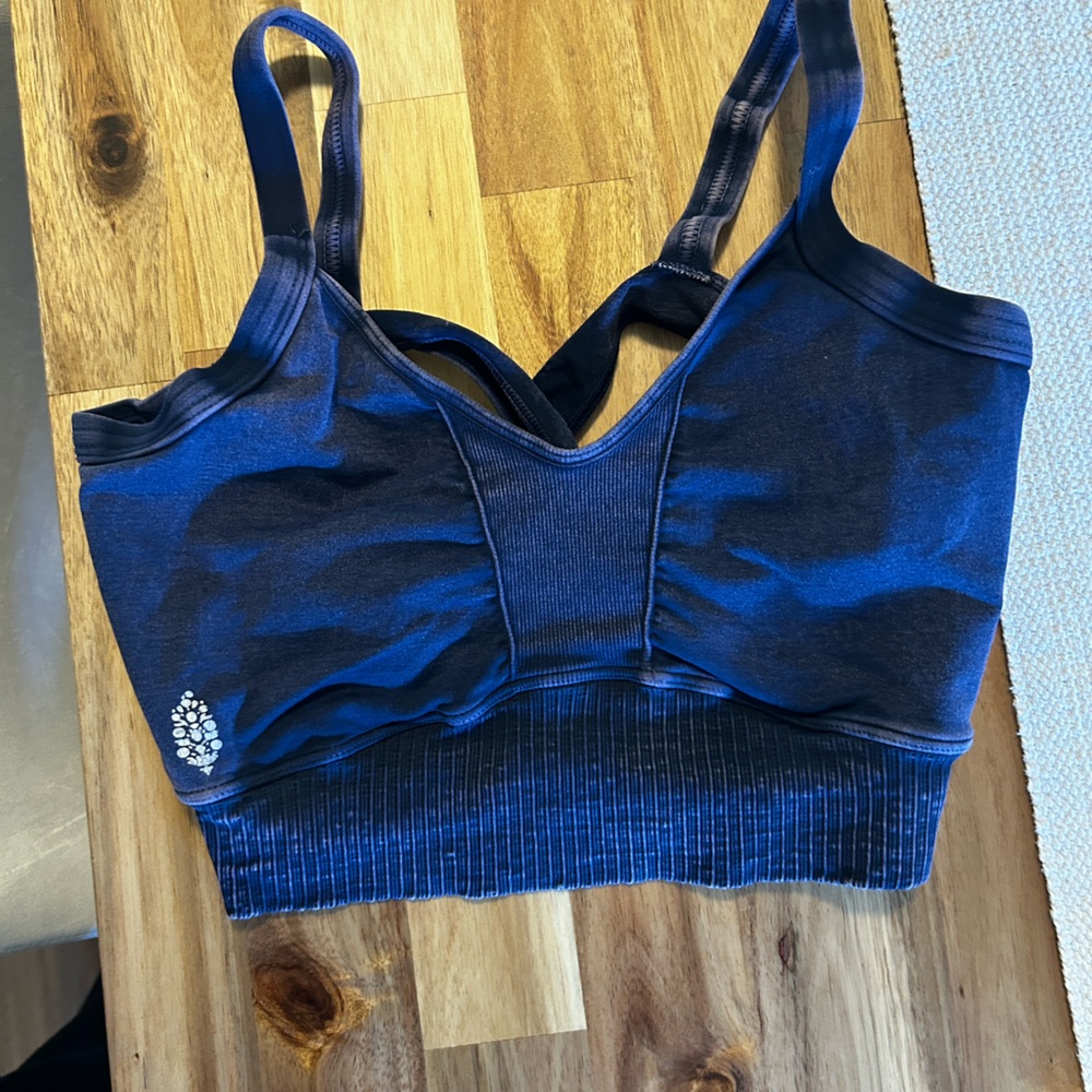 Free people distressed, blue sports bra. Size Medium.